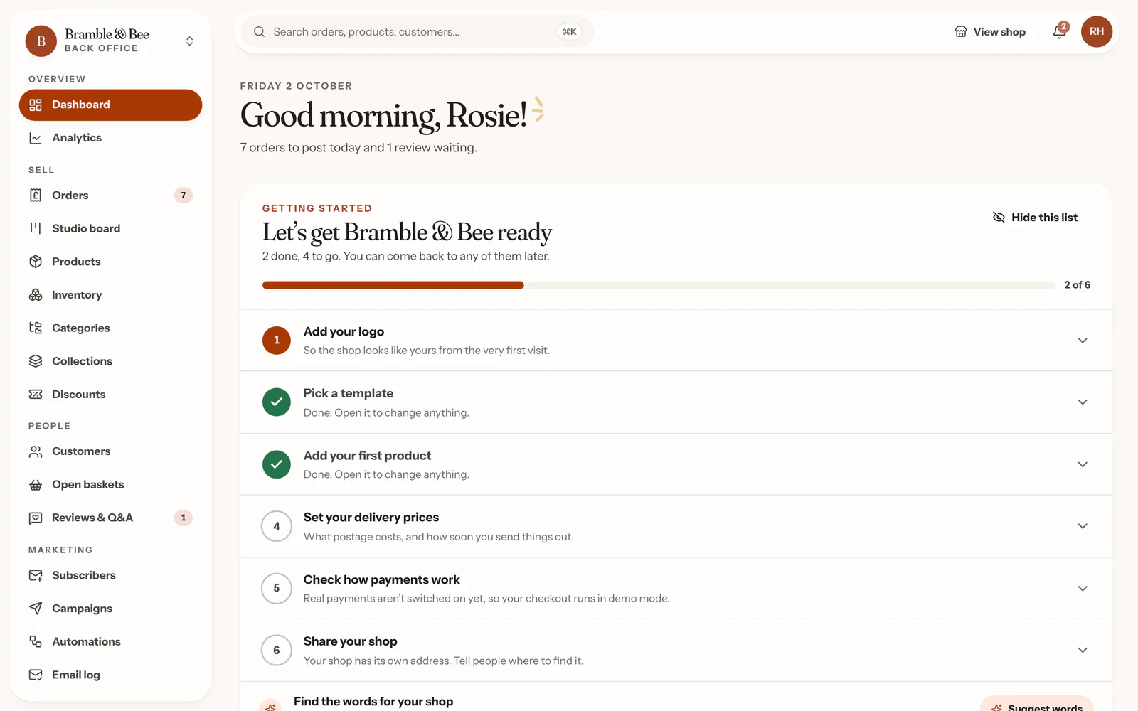 The dashboard’s getting-started list: add your logo, pick a template (done), add your first product (done), set your delivery prices, check how payments work, share your shop